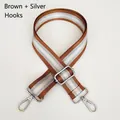 Macro shot of 3.8cm striped nylon bag strap in brown with silver hooks and buckle - Brown + Silver Hook