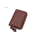 Detail of coffee brown pebble leather RFID wallet with gold zipper closure and puller - Coffee