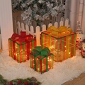 Three-piece set of illuminated Christmas gift boxes in red, green and gold with bows - Red Green Striped Christmas Gift Box