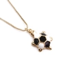 Collar de tortuga minimalista chapado en oro con patrón de esmalte blanco y negro - Blanco + Negro