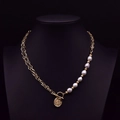 Vintage gold chain necklace with freshwater pearls and coin pendant on a black bust - Layered Cross Thick Chain Pearl Necklace