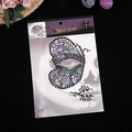 Halloween face gems with purple and black rhinestones in a butterfly pattern - Butterfly