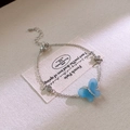 Elegant silver chain bracelet featuring a blue butterfly pendant with crystal accents - Silver Butterfly Bracelet(48#)