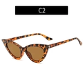Fashion cat-eye sunglasses with tortoiseshell frame and brown lenses in a 45-degree view - Leopard / Brown