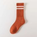 Orange mid-tube wool socks with white stripes on a clean white background - Brick Red