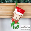 Cat paw Christmas stocking with Good Kitty embroidery and plaid scarf on fireplace - Good Kitty Pet Christmas Stocking
