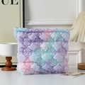 Macro shot of gradient bubble textured makeup bag with zipper closure on home vanity - Rainbow Color 3