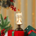 Detail einer kerzenförmigen Weihnachtslaterne mit Engelsfigur und antikem Bronzesockel - Engel