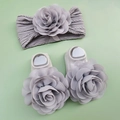 Detailed view of grey baby headband and socks set with large 3D chiffon floral accents - Gray