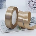 Champagne gold satin ribbon roll with smooth finish for gift wrapping and wedding decor - Light Champagne