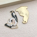 Halloween crow on skull enamel charm with polished gold metal back and black finish - Skull Crow on Book