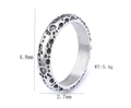 Detail view of silver stainless steel ring with crater texture and polished inner band - US 7 / Blackened Polished (14403)