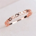 Elegant hollow heart-shaped ring in rose gold finish for a minimalist feminine style - US 5 / Rose Gold