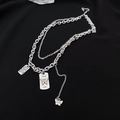 Silver-colored layered necklace featuring a 3D butterfly charm and engraved metal tags - Silver Butterfly Style