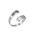 Detail of silver stainless steel cross ring with BLESSED engraved on the open band - Blessed Cross / Steel