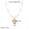 Golden sea turtle pendant necklace with white beads and sea stones on white background - Sea Turtle Style (TN3548)