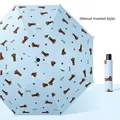 Light blue manual reverse umbrella featuring cartoon dog pattern and matching storage sleeve - Manual Reverse / Sky Blue Dachshund