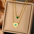Detail of gold double-layer necklace with heart pendants and green stones in a gift box - Green Gemstone Heart Necklace (N-45)