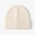 Classic cream rib-knit beanie hat featuring a soft wool texture and wide folded cuff - Cream