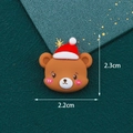 Christmas bear resin charm in brown with red hat, measuring 2.3cm by 2.2cm for DIY crafts - Bear