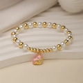 Bracelet en perles avec pendentif cœur rose émaillé et détails en métal doré - Pendentif Coeur Rose
