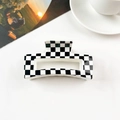 Detail of checkered hair claw clip with black and white square pattern in rectangular shape - Cream White Black Checkered