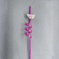 Close-up of pink spiral plastic straw with sparkling fruit slice glitter charm detail - Watermelon 2