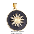 Detailed view of a black sunburst medallion pendant with gold trim and crystal inlay - Style 12