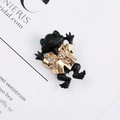 Elegante broche de rana vintage con acabado negro mate y lazo dorado con cristales - Estilo Lazo Negro Dorado