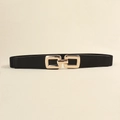Dettaglio della cintura elastica nera da donna con fibbia in metallo dorato intrecciato - Nero / 60CM