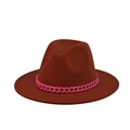 Close-up of rust red wool fedora with vibrant pink chunky chain link decoration - Color 13