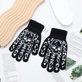 Black knit fingerless gloves with white skeleton and flame pattern in glow style - One Size / Full Finger Patterned Skull