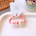 Close-up of pink elastic hair ties with cute resin bunny charms on white display tray - Pink Rabbit Style