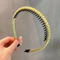 Detail showing non-slip toothed plastic base with light yellow-green fabric wrap headband - Light Green