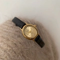 Montre quartz vintage pour femme avec boîtier ovale doré et bracelet en cuir noir - Bracelet en Cuir Noir Cadran Ovale / Noir