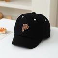 Detail of black cotton kids baseball cap with brown letter P embroidery and white eyelets - 50cm (1-3 Years) / Black