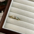 Golden H-shaped ring with dual enamel bands in white and light blue and small diamonds - J5251-H Letter Blue Enamel