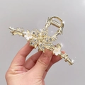 Elegant gold alloy hair claw clip with crystal rhinestones and white floral details - Plum Blossom Branch