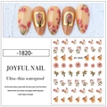 Macro detail of JO-1820 floral nail stickers with red roses and ultra-thin waterproof film - Model JO-1820