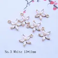 Set of six gold-plated flower pendants with marquise-cut zircon stones measuring 13x11mm - White