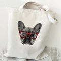Beige canvas tote bag with French Bulldog wearing red glasses print and top handles - Bulldog with Red Glasses (T)