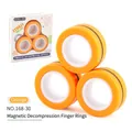 Set di tre anelli magnetici antistress in vivace arancione e bianco rifinito - 35.0g / 168-30 Arancione