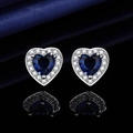 Blue heart-shaped stud earrings with halo diamonds and silver finish on black surface - Blue Diamond Heart-shaped Earrings Led-72