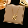 Elegant gold titanium steel snake chain necklace with a polished balloon letter K pendant - Gold-K