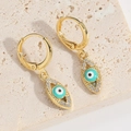 Boucles d'oreilles baroques dorées avec œil protecteur turquoise et zircons brillants - Yeux Bleu Lac (ES2731)