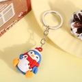 3D cartoon penguin PVC keychain wearing a red scarf and Christmas hat with silver ring - Penguin (Silver Keychain)