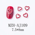 Detail of red hollow heart nail charms with silver metal frame and rhinestones - Dense Fine Rhinestone Heart (AJ109)