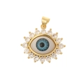 Macro shot of gold devil eye pendant with blue zircon stones on a white background - DZ293-Rhinestone Round Eye