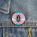Rainbow bee enamel pin on blue denim jacket featuring transgender pride flag colors - Transgender (XZ1686)
