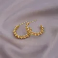 Elegant gold-tone C-shape hoop earrings with hollow woven texture and bead details - Woven Hollow Ball / E-074---Gold